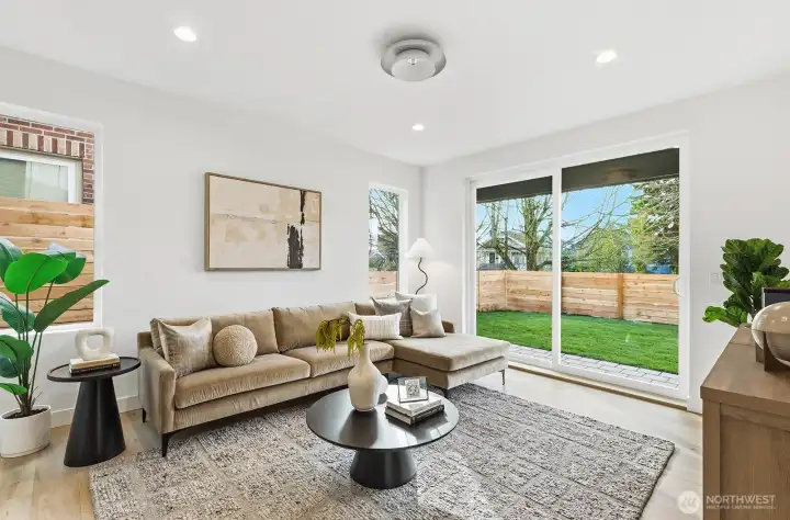 Family/rec room on the lower level with access to a fenced yard.