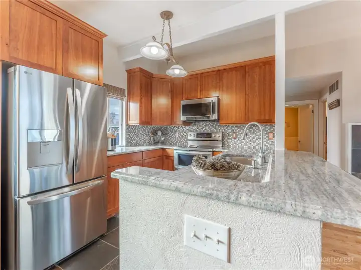 Updated kitchen blending modern upgrades with mid-century charm.Updated kitchen blending modern upgrades with mid-century charm.