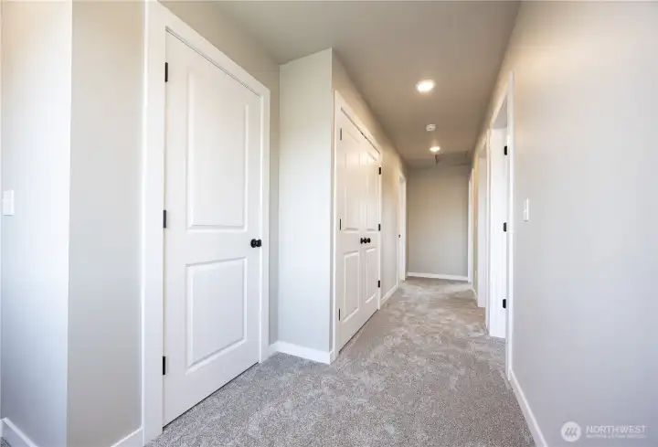 Linen closet and washer and dryer closet on the second level