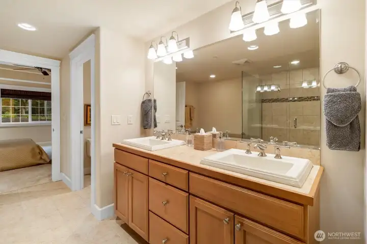 Kohler sinks and fixtures add quality and consistency throughout the space.