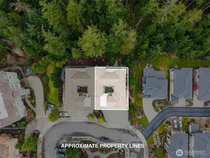 Aerial view highlighting the condo’s location within a well-maintained building of just four units, offering a more private setting.