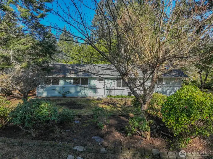 Beautiful mature trees all around for a little privacy from your neighbors.