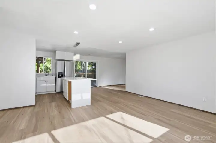 Open great room offers lots of natural light.