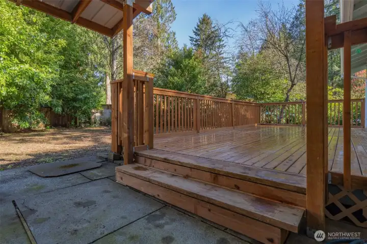 View of a portion ofthe backyard off of the covered patio.