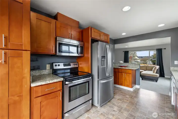 Kitchen with modern refrigerator.