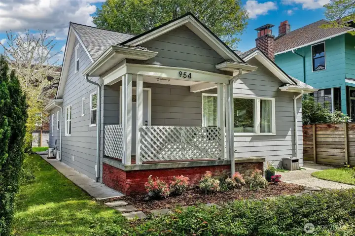 Set up and high above the street is this renovated, classic Craftsman bungalow.