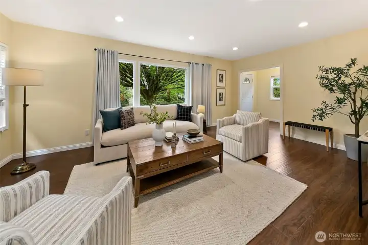 From the covered porch, once inside discover a formal entry with coat closet and large scale living room.