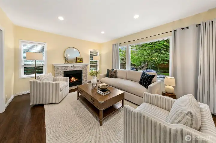 The main floor enjoys light from many directions through large picture windows.