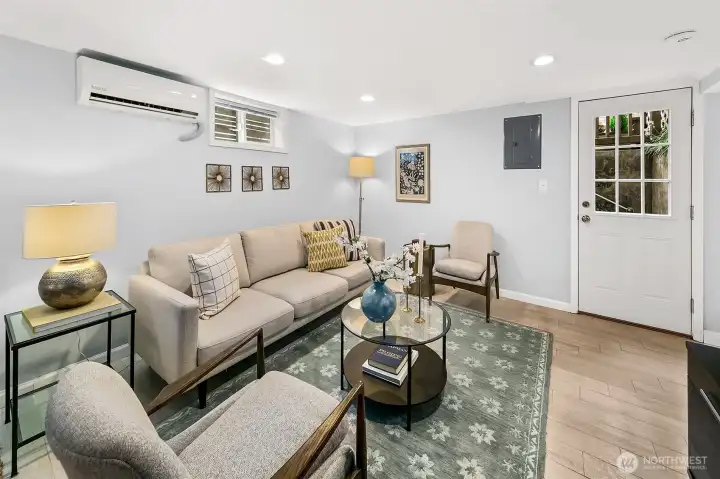 The finished lower level is accessed via the backyard or through the laundry area.