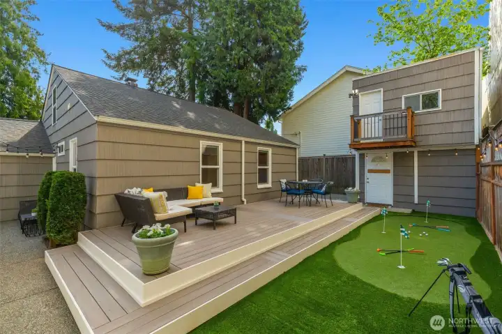 Backyard with TimberTech deck and putting green
