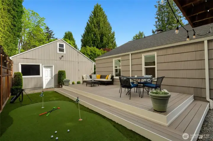 Backyard with TimberTech deck and putting green