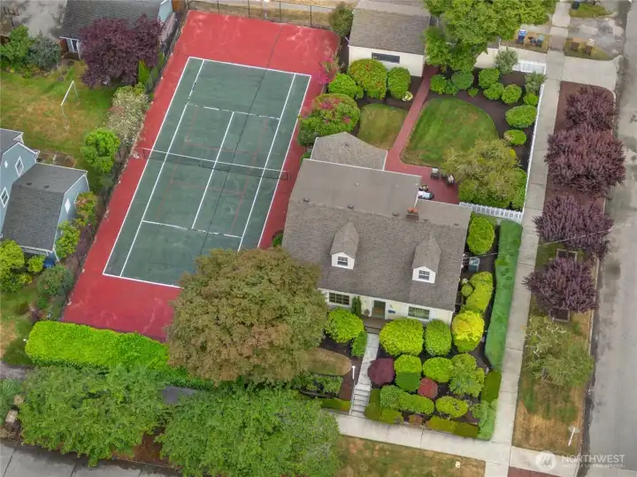 Two lots. One with a home and one with a full sized sport court!