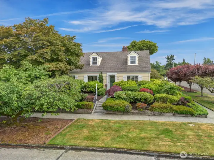 Timeless 1940’s Estate with mature landscaping and sprinkler system.