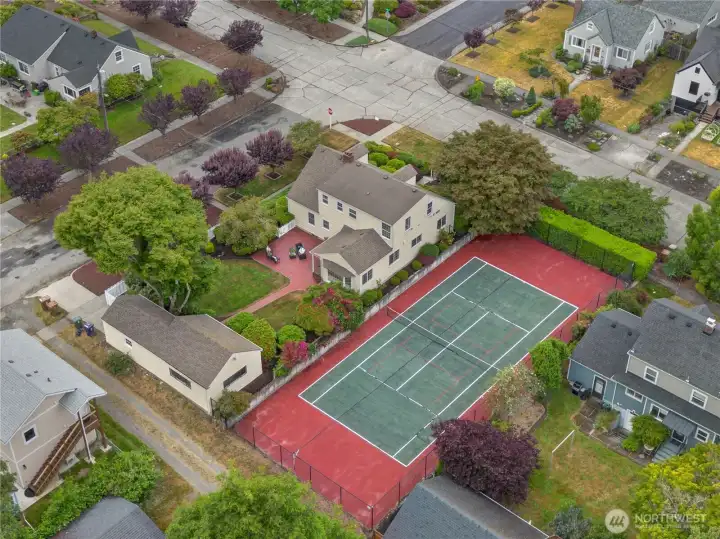 Incredible Estate with 2, 6,000 square foot parcels, a traditional Cape Cod home and full size sport court. All close to local parks, schools and local businesses.