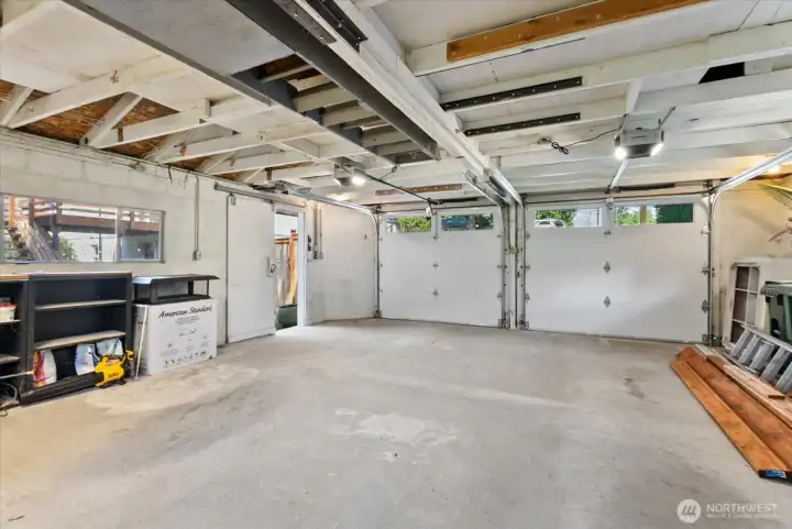 2 car garage with opener and storage space