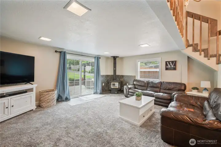 Family room with wet bar, wood stove Family room with wet bar, wood stove