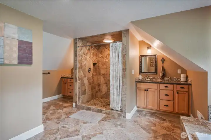 Primary bathroom with soaking tub, double vanity, standalone shower and walk in closet Primary bathroom with soaking tub, double vanity, standalone shower and walk in closet