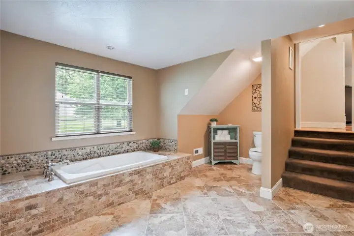 Primary bathroom with soaking tub, double vanity, standalone shower and walk in closet Primary bathroom with soaking tub, double vanity, standalone shower and walk in closet
