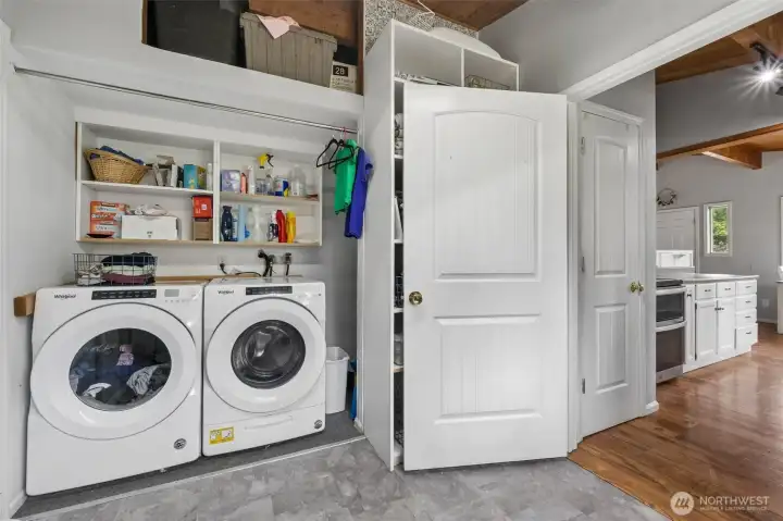 Laundry off the kitchen with access to the backyard. Laundry off the kitchen with access to the backyard.