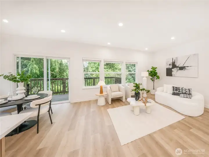 Breakfast nook and living room with stunning nature views.