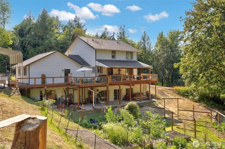 Huge back deck, mature gardens, but most importantly... Privacy and Tranquility.