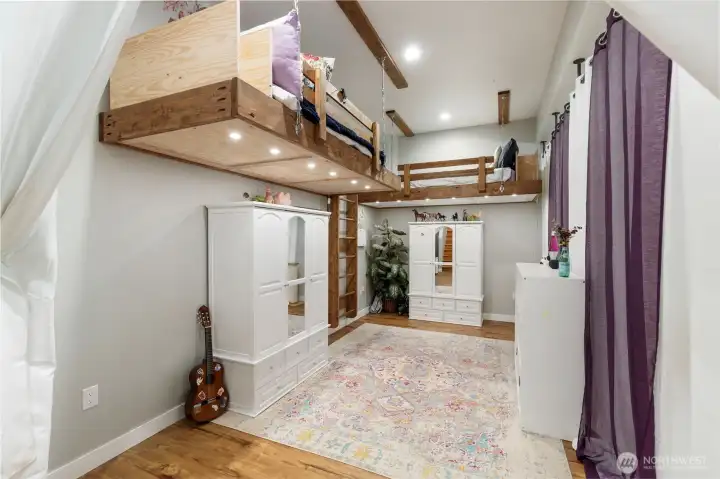 Basement area has built- in loft platforms for reading/playroom area