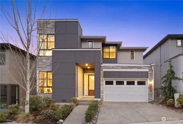 Newly built in 2021 and set at the top of Talus in the desirable Panorama community- this luxury view home has it all! Front landscaping is covered by the HOA. Modern, sleek exterior styling with an open floor plan and luxury finishes.