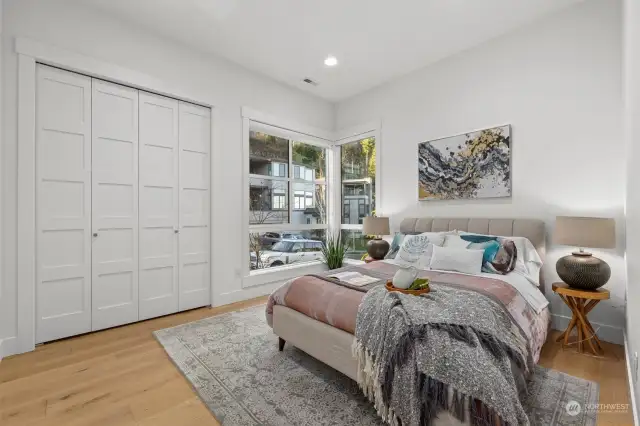 Main level office or bedroom. This room is adjacent to oversized shoe closet with built in shelving.