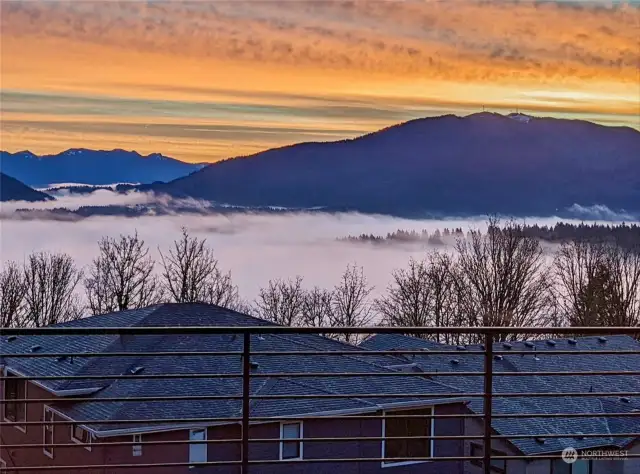 Magical mornings await you- unobstructed mountain views from main and upper levels plus multi-level covered decks.