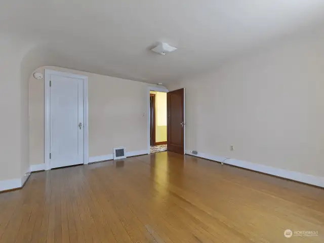 Upstairs bedroom with gorgeous hardwood floors.