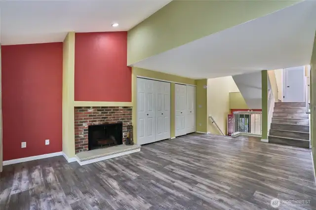 Great view of the open vaulted ceiling of living room.
