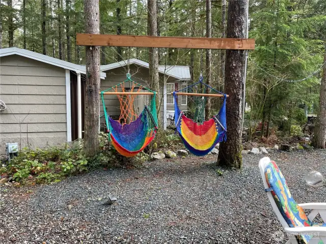 Relax by the fire in these two hammocks!