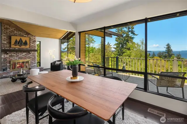 The formal dining space is perfectly positioned between the living room and the kitchen. Whether you choose the living room, formal dining room, kitchen bar or casual dining space - all on the upper level - you have incredible views to sooth the senses while enjoying a meal.