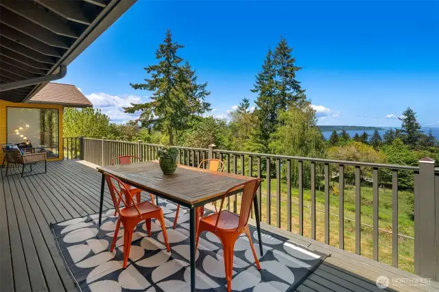 Just out the dining nook door is one of many decks.
