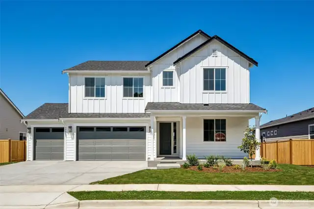 Actual home: farmhouse elevation, 3-car garage