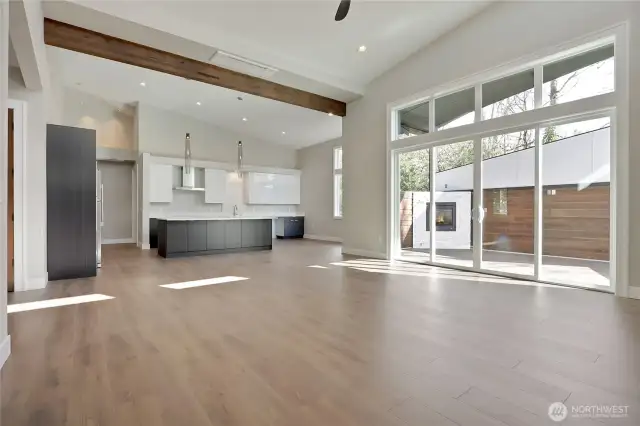 Large Sliding Door provides access to covered back porch equipped with gas fireplace.