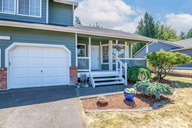 Large front porch welcomes you home.