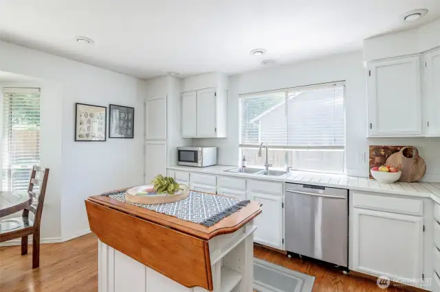 Functional kitchen with eating nook.