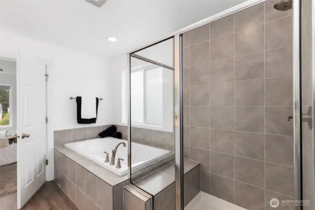 Separate tub and showers in Primary bath.