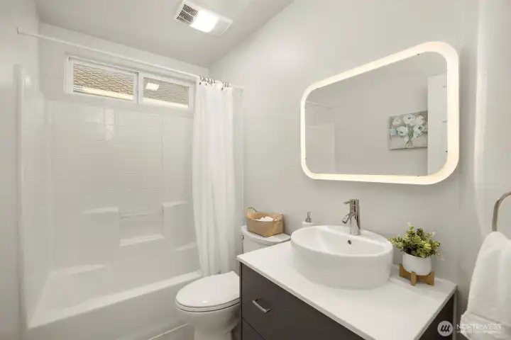 Upstairs hall bath is beautifully remodeled