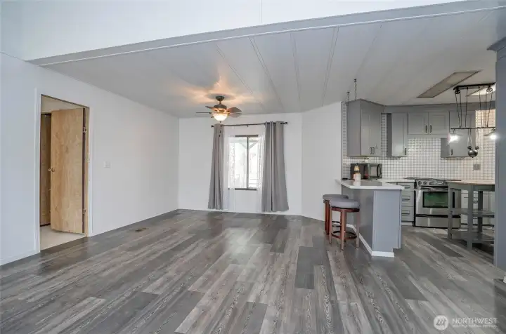 Spacious living area offering a seamless flow into the dining and kitchen.