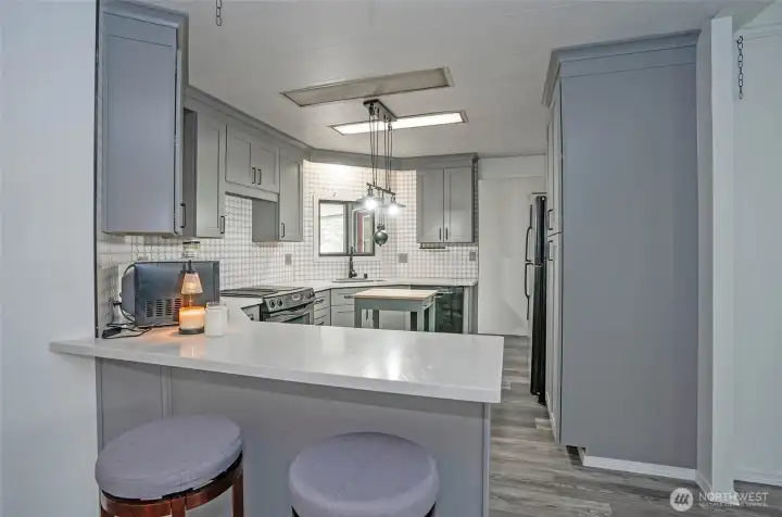 A modern, beautifully updated kitchen designed for effortless meal prep.