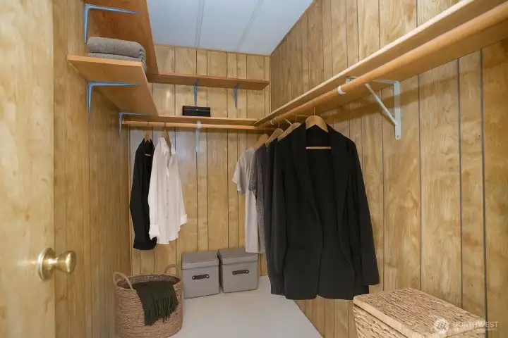 Walk-in closet in the primary suite.