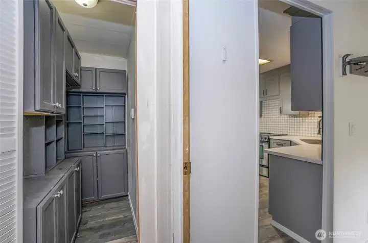 Handy walk-in pantry located right around the corner from the kitchen.