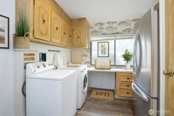 Wonderful utility room for ease of everyday function and use.