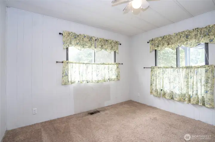 Guest suite situated on the opposite side of the primary bedroom for added separation.