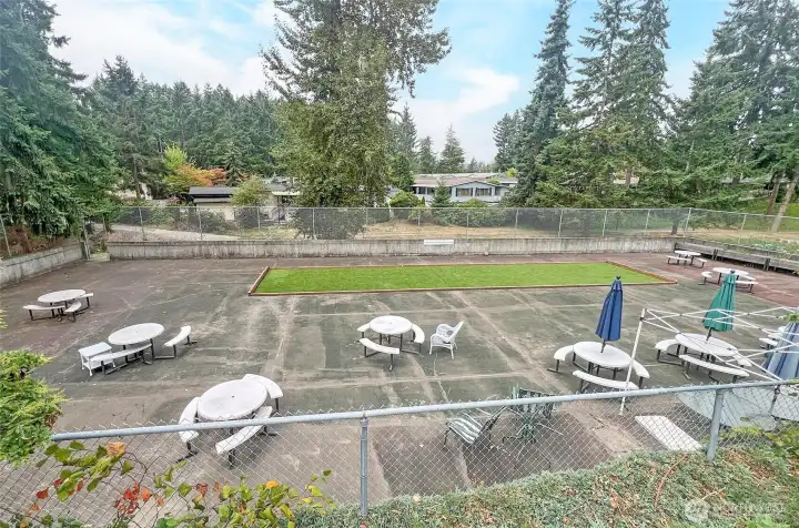 Relax in the courtyard, with space for leisure and bocce ball fun.