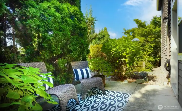 back patio in a serene setting-perfect for an outdoor BBQ