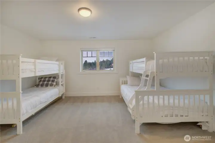 The bunk house sleeps 5 with adjacent 3/4 tiled bathroom