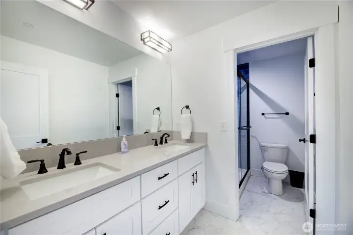Bunk house bathroom, dual sinks and 3/4 shower